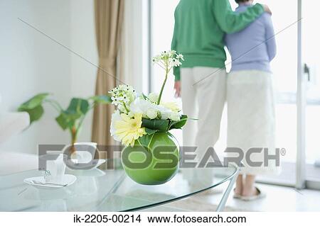 Couple standing in front door View Large Photo Image Picture - Couple standing in front door. Fotosearch