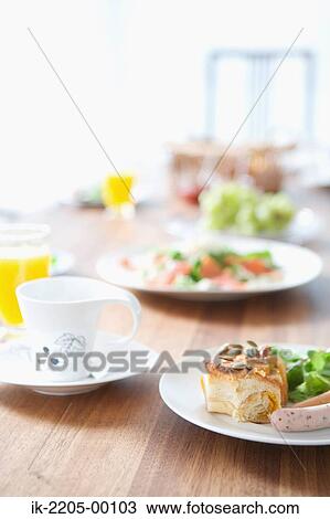 Stock Image - Delicious food in plates. Fotosearch