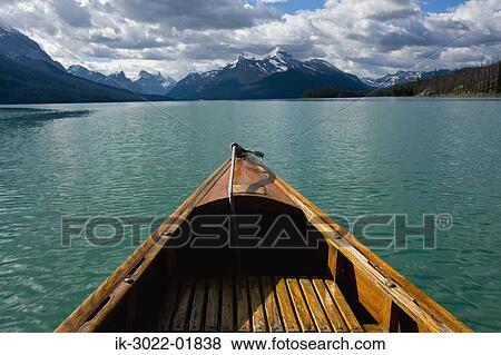 Empty Boat Near the Merlene Lake in Canada View Large Photo Image Stock Photo - Empty Boat Near the Merlene Lake in Canada. Fotosearch