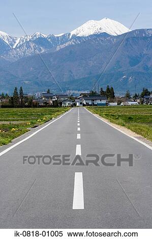 Empty Road Leading To Houses in Northern Alps, Hokkaido View Large Photo Image Stock Photography - Empty Road Leading To Houses in Northern Alps, Hokkaido. Fotosearch