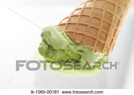 Stock Image - Fallen Ice Cream Cone, Melting. Fotosearch