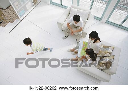 Family in Living Room View Large Photo Image Stock Image - Family in Living Room. Fotosearch