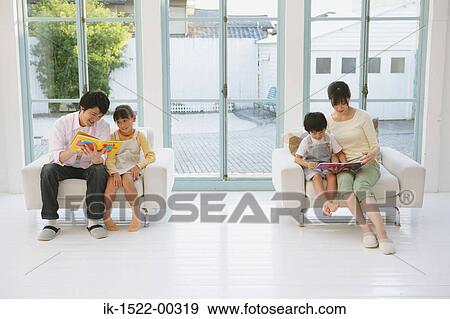 Family Sitting in Separate Chairs View Large Photo Image Stock Photo - Family Sitting in Separate Chairs. Fotosearch