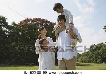 Family Walking in Park View Large Photo Image Stock Photo - Family Walking in Park. Fotosearch