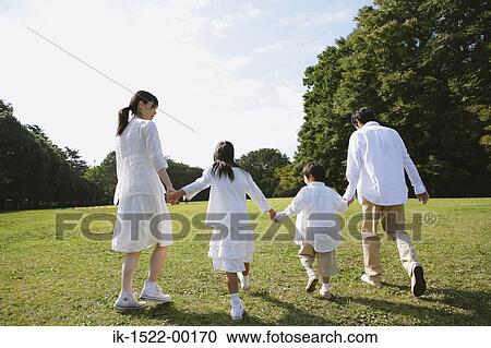 Stock Image - Family Walking Together. Fotosearch