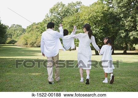 Family Walking Together View Large Photo Image Stock Photo - Family Walking Together. Fotosearch