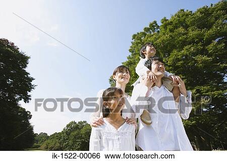 Family Walking Together View Large Photo Image Stock Photograph - Family Walking Together. Fotosearch