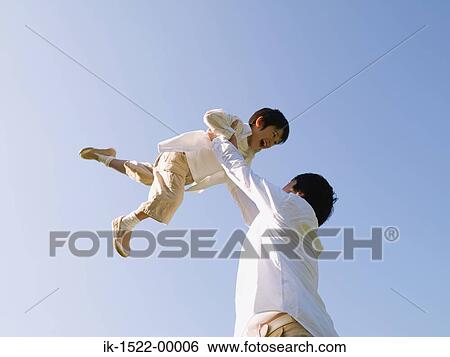 Father Playing with Son View Large Photo Image Stock Photograph - Father Playing with Son. Fotosearch