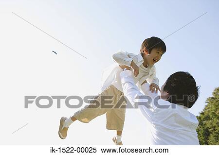 Stock Photography - Father Playing with Son. Fotosearch