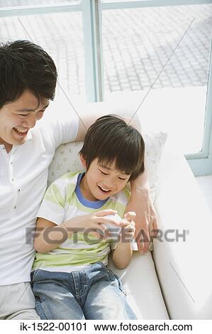 Father Sitting with Son View Large Photo Image Stock Image - Father Sitting with Son. Fotosearch