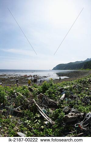 Stock Image - Garbage Kept in the Seashore. Fotosearch