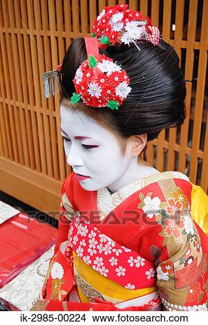 Picture - Geisha in Traditional Make-Up and Wearing Kimono. Fotosearch