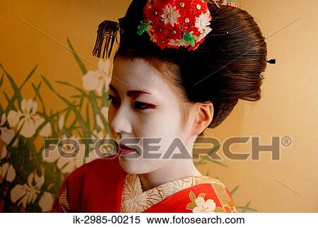 Stock Photography - Geisha in Traditional Make-Up and Hairstyle. Fotosearch