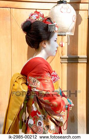 Stock Image - Geisha Wearing Traditional Costume. Fotosearch
