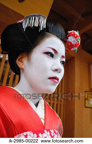 Stock Image - Geisha Woman in Traditional Make-Up. Fotosearch