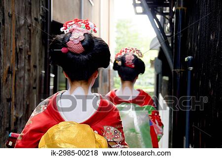 Geisha Women Walking on Street in Kyoto, Japan View Large Photo Image Stock Photo - Geisha Women Walking on Street in Kyoto, Japan. Fotosearch