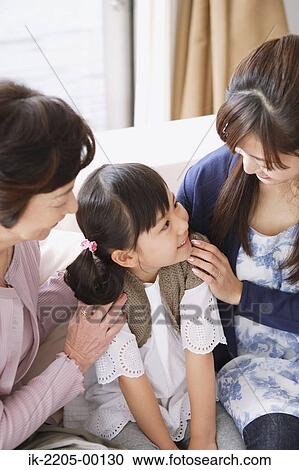 Stock Image - Girl with mother and grandma. Fotosearch