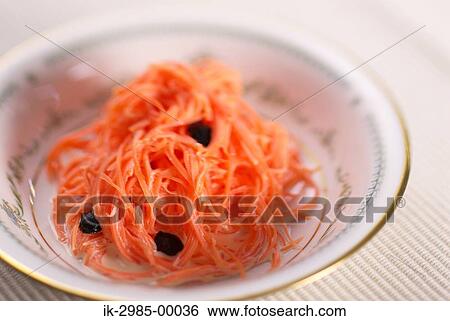 Stock Photograph - Grated Carrot Salad in Bowl. Fotosearch