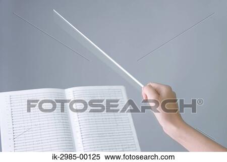Stock Photography - Hands Holding Baton. Fotosearch