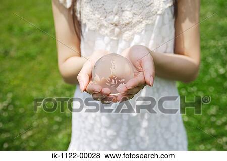Hands holding globe View Large Photo Image Stock Photo - Hands holding globe. Fotosearch