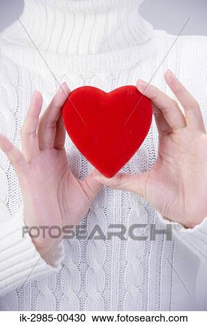 Stock Image - Hands Holding Heart. Fotosearch