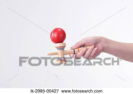 Hands Holding Kendama View Large Photo Image Stock Photo - Hands Holding Kendama. Fotosearch