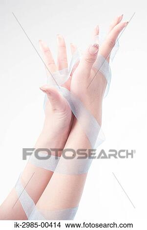 Picture - Hands Tied with Ribbon . Fotosearch