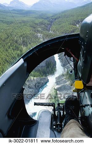 Helicopter in Canadian Rockies View Large Photo Image Stock Image - Helicopter in Canadian Rockies. Fotosearch
