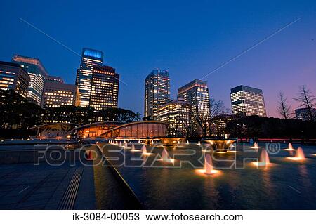Illuminated buildings in downtown View Large Photo Image Stock Image - Illuminated buildings in downtown. Fotosearch