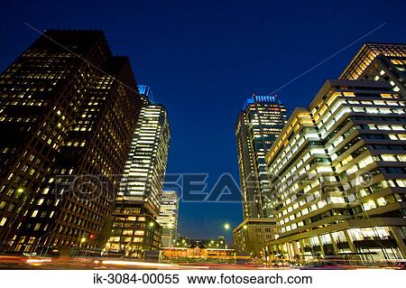 Illuminated buildings in evening View Large Photo Image Stock Photography - Illuminated buildings in evening. Fotosearch