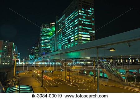 Illuminated skyscrapers, bridge and roads View Large Photo Image Stock Photo - Illuminated skyscrapers, bridge and roads. Fotosearch