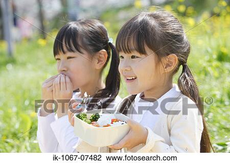 Japanese girls eating lunch together View Large Photo Image Stock Image - Japanese girls eating lunch together. Fotosearch