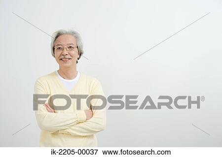 Stock Photo - Japanese senior man smiling. Fotosearch