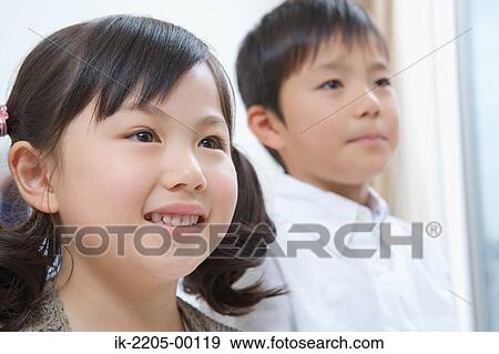 Stock Photo - Japanese siblings together. Fotosearch