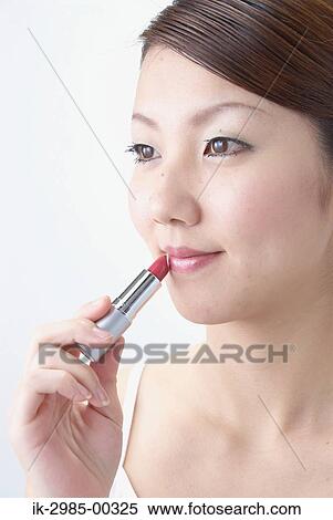 Japanese Woman Applying Lipstick View Large Photo Image Stock Photography - Japanese Woman Applying Lipstick. Fotosearch