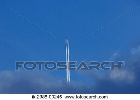 Stock Photography - Jet Stream Across Blue Sky. Fotosearch