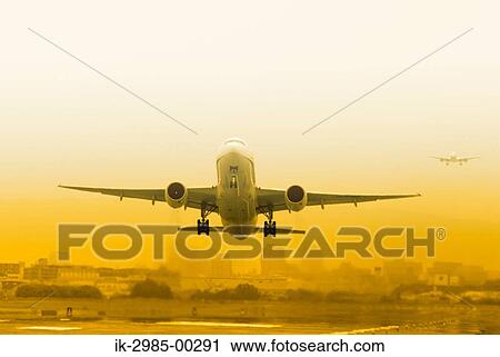 Stock Image - Jumbo Jet Taking Off From the Runway at International Airport. Fotosearch