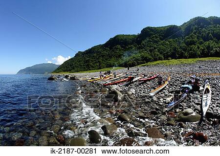 Stock Image - Kayak at the Edge of River, Japan. Fotosearch