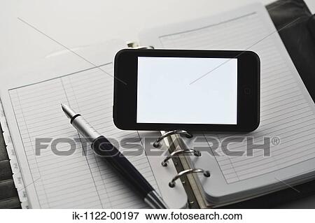 Laptop computer with moblie phone View Large Photo Image Stock Photo - Laptop computer with moblie phone. Fotosearch