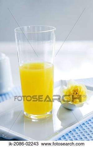 Lemon juice and yellow rose View Large Photo Image Stock Image - Lemon juice and yellow rose. Fotosearch