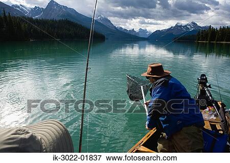 Man Fishing with Fishing Net in Merlene Lake View Large Photo Image Stock Photo - Man Fishing with Fishing Net in Merlene Lake. Fotosearch