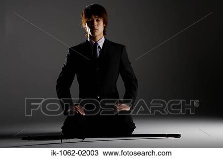 Stock Image - Man Meditating. Fotosearch