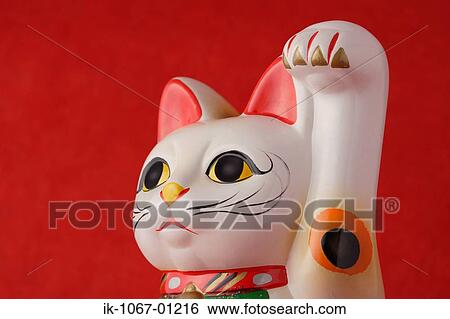 Stock Photograph - 'Maneki Neko' doll . Fotosearch