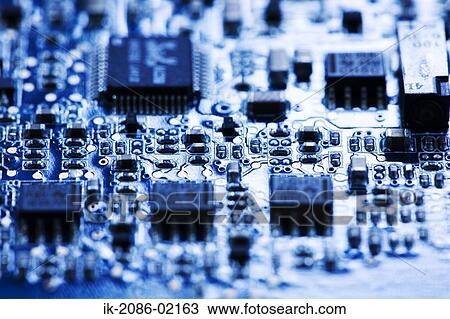 Stock Image - Microchips on computer motherboard. Fotosearch