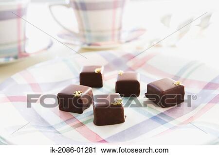 Milk Chocolates in a Plate View Large Photo Image Stock Image - Milk Chocolates in a Plate. Fotosearch