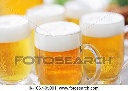 Stock Image - Mugs of Beer. Fotosearch