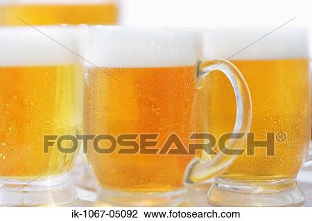Stock Image - Mugs of Beer. Fotosearch