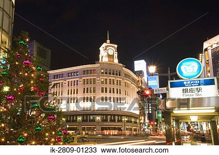 Stock Image - Night View of Ginza Station in Tokyo, Japan. Fotosearch