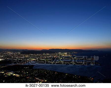 Stock Photography - Night View of Illuminated Skyscraper . Fotosearch
