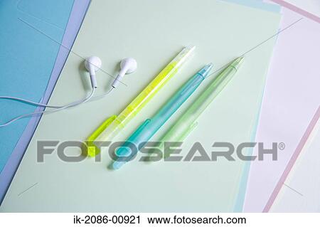 Pen and Colorful Paper with Earphone View Large Photo Image Stock Image - Pen and Colorful Paper with Earphone. Fotosearch